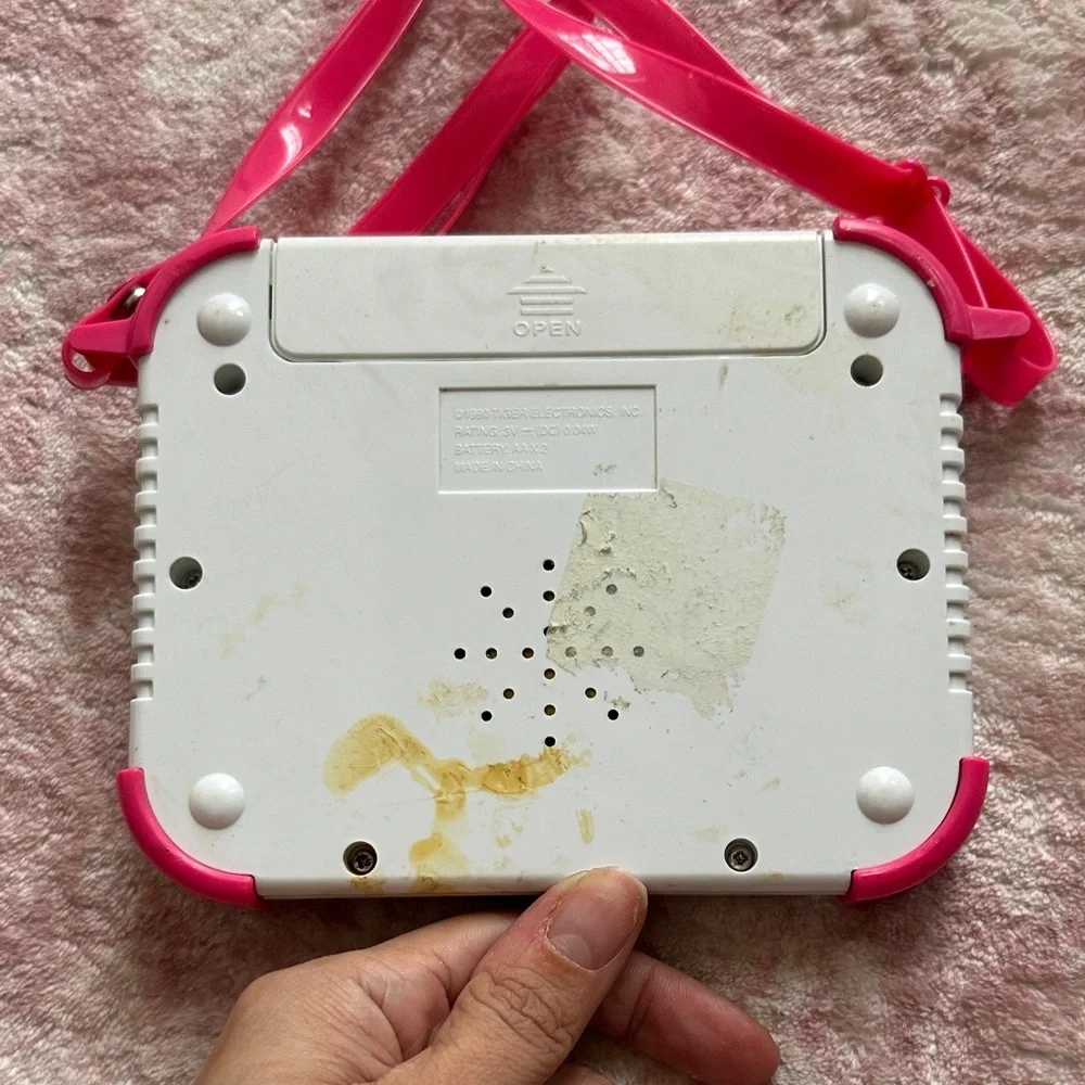 Vintage 1990 Tiger Electronics Snow White Handheld Game with purse strap
